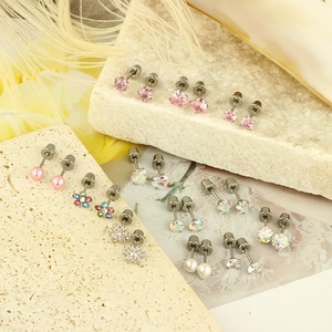Set of 12 pairs of minimalist screw back stud earrings with heart and star designs