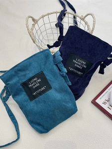 Navy and lake blue corduroy crossbody phone bags in a minimalist retro texture style