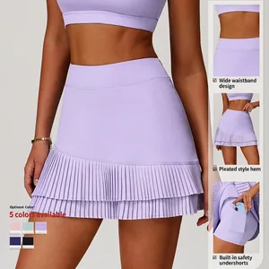 High-waisted lavender pleated sports skort with built-in shorts and phone pocket