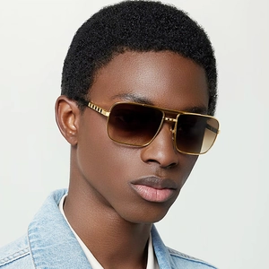 Retro pilot sunglasses with gold metal frame and brown gradient lenses for men
