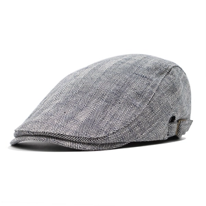 Classic grey herringbone flat cap with adjustable metal side buckles on a white background