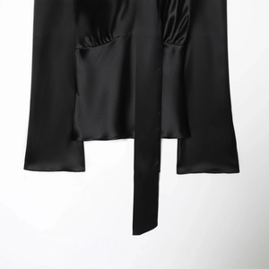Elegant black satin scarf collar shirt featuring a smooth silky texture and long tie design