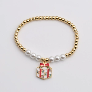 Bracelet de Noël avec perles dorées, perles blanches et pendentif boîte cadeau rouge