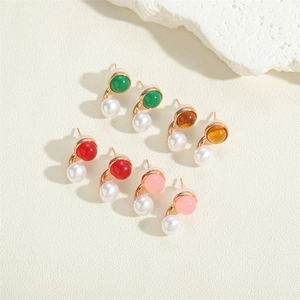 Elegant acrylic flower earrings with white pearls in multiple colors on a stone base