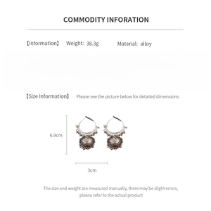 Size chart showing retro bohemian hollow earrings dimensions of 6.9cm height and 3.0cm width
