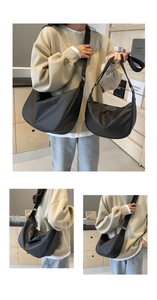 Detailed size comparison of black nylon crossbody dumpling bags in large and small sizes