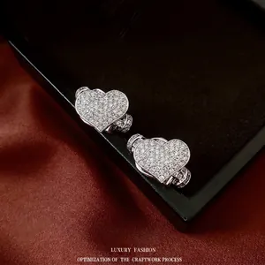 Luxurious horseshoe ear cuff with zirconia stones on a premium black jewelry box display