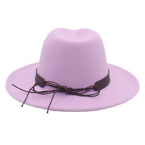 Detailed view of lavender wide brim fedora with brown faux leather band and rope