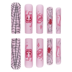 Pink matte Halloween press on nails with coffin shape featuring pumpkin and web designs