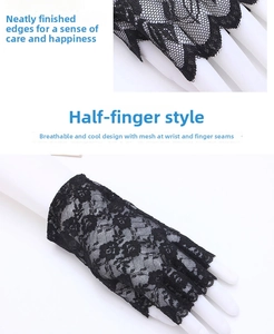 Detail of black floral lace fingerless gloves with breathable mesh and neat seam edging