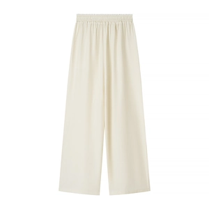 Detail of off-white wide-leg pants featuring ribbed texture and elastic waistband