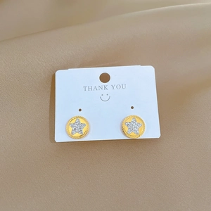 Minimalist titanium steel pentagram stud earrings with gold finish and sparkling diamonds