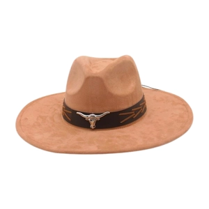 Close-up of khaki wide-brim cowboy hat featuring a silver bull head metal badge detail