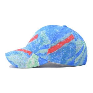 Geometric gradient baseball cap with blue green watercolor graffiti and red stripes