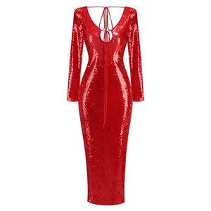 Detail of red sequined long sleeve dress with deep V-neck and open back tie design
