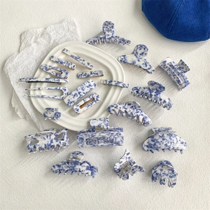 Elegant set of blue and white marble pattern hair claws and clips in porcelain style