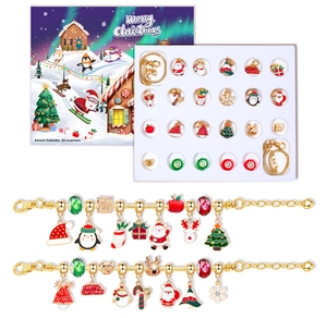 Christmas Advent Calendar set with 24 festive charms and two golden DIY bracelets for kids