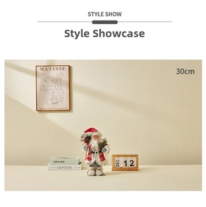 Detail shot of a 30cm Santa Claus figurine showing high-quality fabric and plush textures