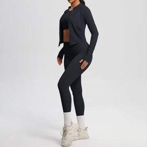 Three-piece black yoga set with high waist leggings and slim fit zipper jacket