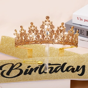Birthday Queen set featuring a gold rhinestone tiara and champagne glitter sash