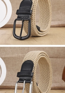 Close-up of beige woven elastic belts with black leather ends and metal buckles