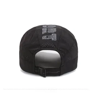 Detail of black sports cap featuring breathable mesh and adjustable buckle strap at back