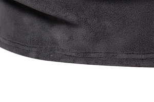 Detail of double-needle stitching on the hem of dark grey polar fleece hoodie