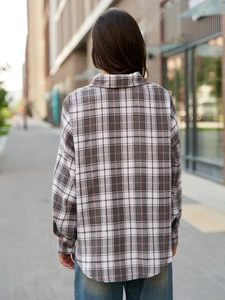 Relaxed fit plaid button-down shirt for women in black grey and pink checkerboard pattern