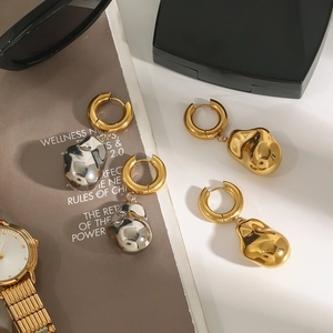 Minimalist 18K gold and silver stainless steel earrings with irregular molten drop charms