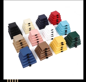 Stack of colorful drawer jewelry boxes in twelve shades for necklaces and bracelets
