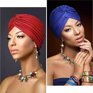 Women's pleated turban headwear in vibrant red and blue colors for stylish head cover