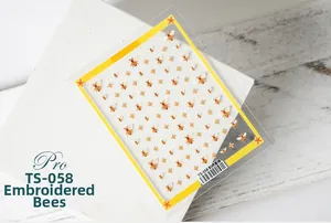 Detailed embroidery style 5D bee and flower nail art decals with embossed texture