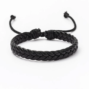 Detail of hand-woven black leather bracelet with adjustable drawstring closure