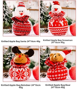 Detail view of 24x16cm knitted Christmas gift bags with Santa and Reindeer designs
