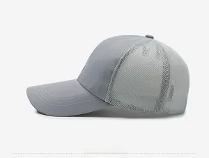 Close-up of side profile of a gray breathable mesh baseball cap with reinforced stitching