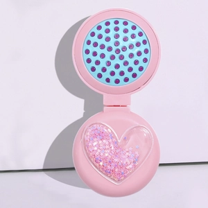 Pink foldable hairbrush with heart-shaped glitter sequins and colorful bristles