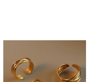 Detailed view of layered gold wave design adjustable open ring for women