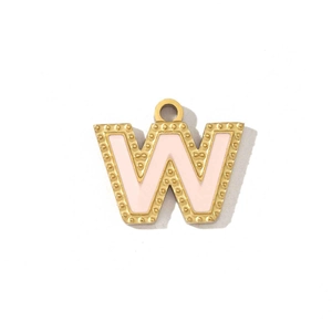 Close-up of pink enamel letter W pendant with gold-plated beaded edge detail