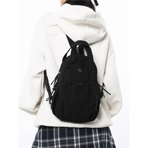 Lightweight black mini sports backpack for women and men, ideal for daily commute and travel