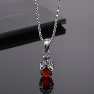 Collier griffe de dragon gothique avec pendentif pierre rouge sur chaîne argentée