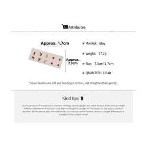 Detail view of 10-piece mini fruit stud earring set featuring alloy and silver needles