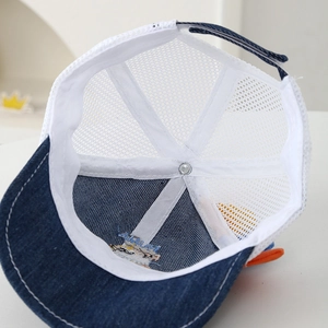 Detail view of baby dinosaur cap showing internal mesh, stitching and adjustable strap
