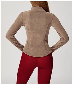 Rear view of brown outdoor fleece jacket showing slim fit cut and plush texture