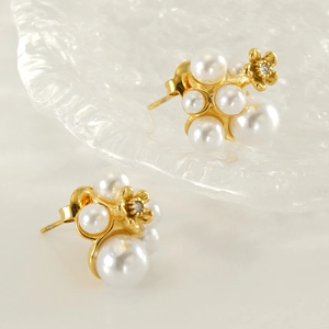 Elegant gold pearl flower earrings with white pearls and center crystal for women
