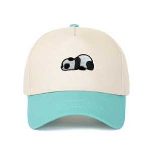 Close-up of panda embroidery on cotton baseball cap with mint green brim detail