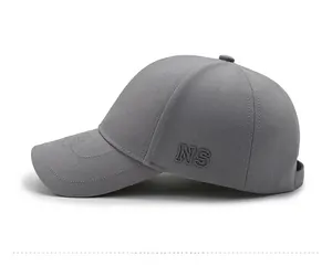 Detail view of dark grey mesh baseball cap featuring NS letter embroidery on the side