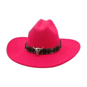 Detail of rose red fedora hat with ethnic woven band and silver bull head accessory