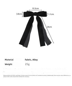 Dettaglio delle dimensioni del fermaglio a fiocco in chiffon nero con nastri
