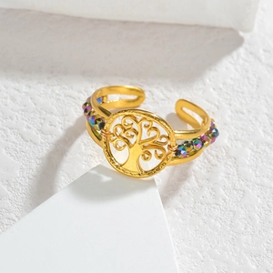 Detail of 18k gold tree of life ring featuring colorful faceted beads and open band