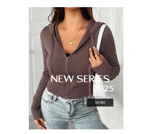Detail view of brown zip-up hoodie featuring wide ribbed cuffs and hem and a metal zipper